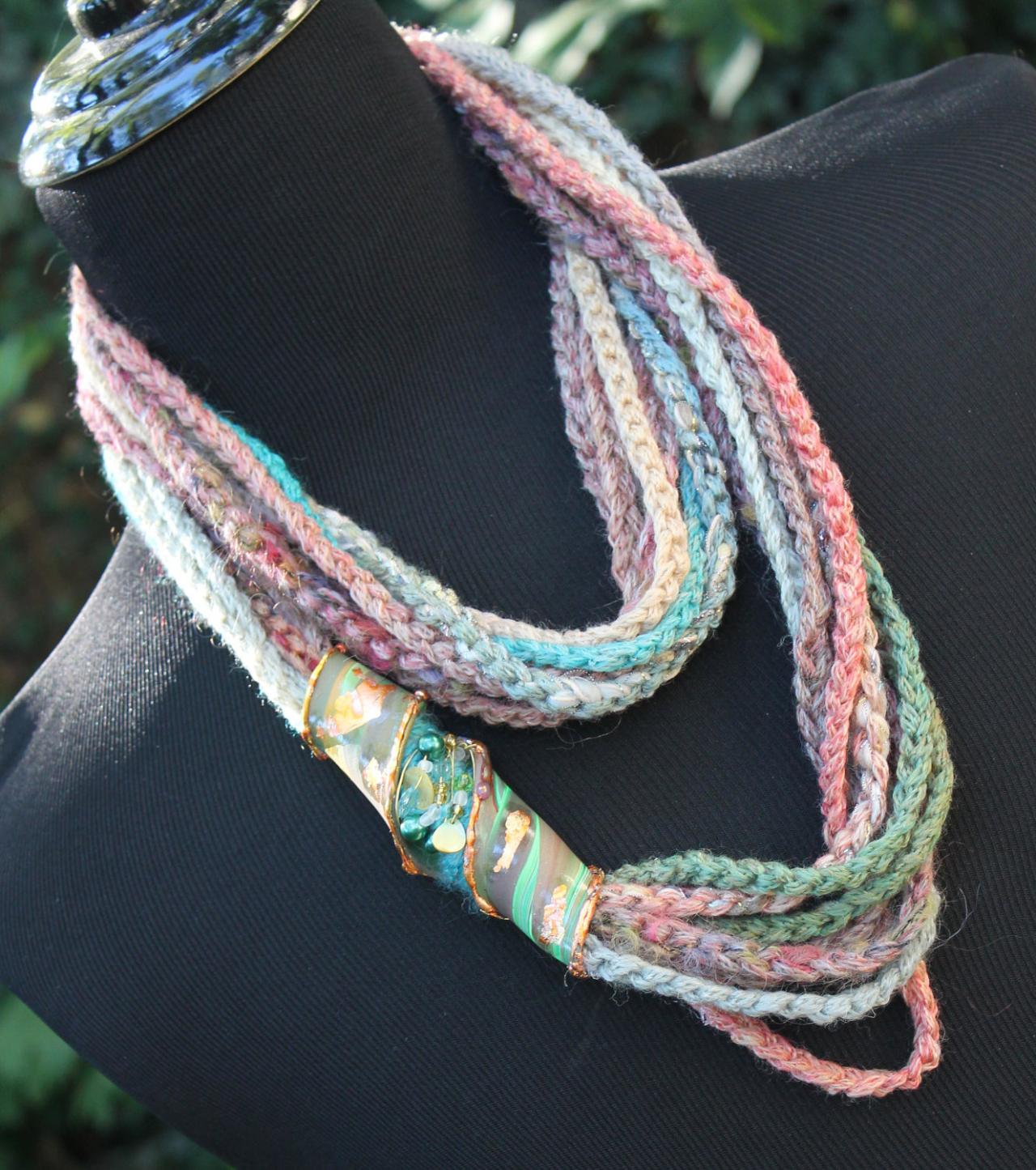Gifted at Cannes GBK Gift Lounge, Sunset colored wrap scarf with jeweled, beaded twist, gold leaf embossed, sea green, copper, rose, teal